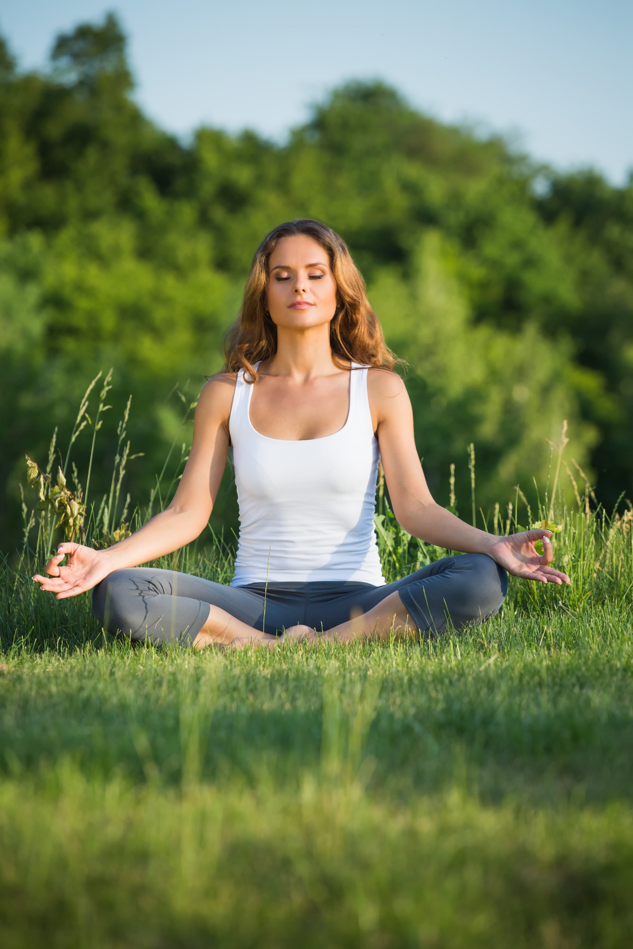 Person practicing meditation for healing